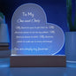 Heart-shaped acrylic LED plaque with the message "To My One and Only" in white font, featuring a romantic and heartfelt design, softly illuminated by LED lighting.